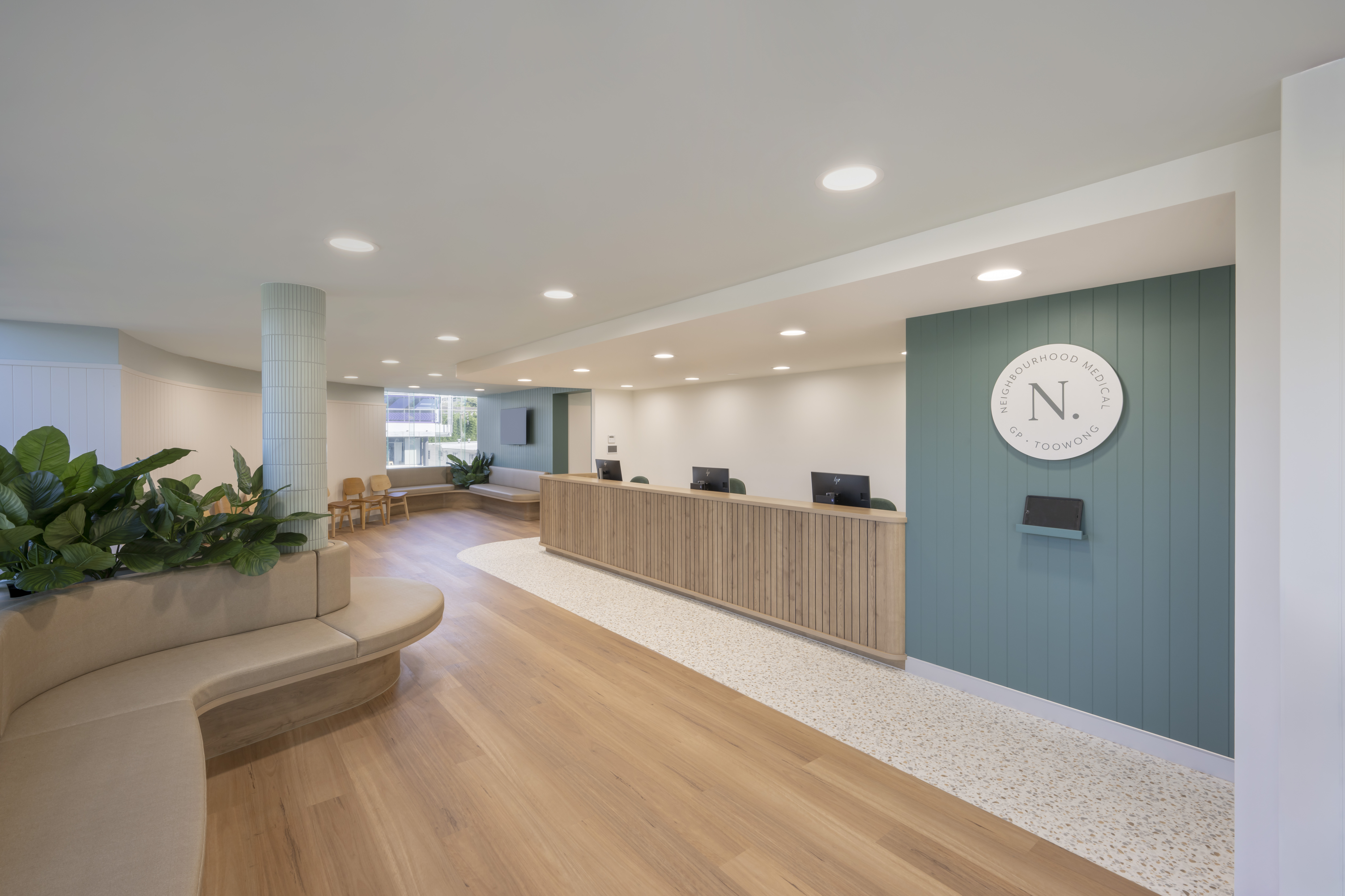 teal, wood, green and white tones interior